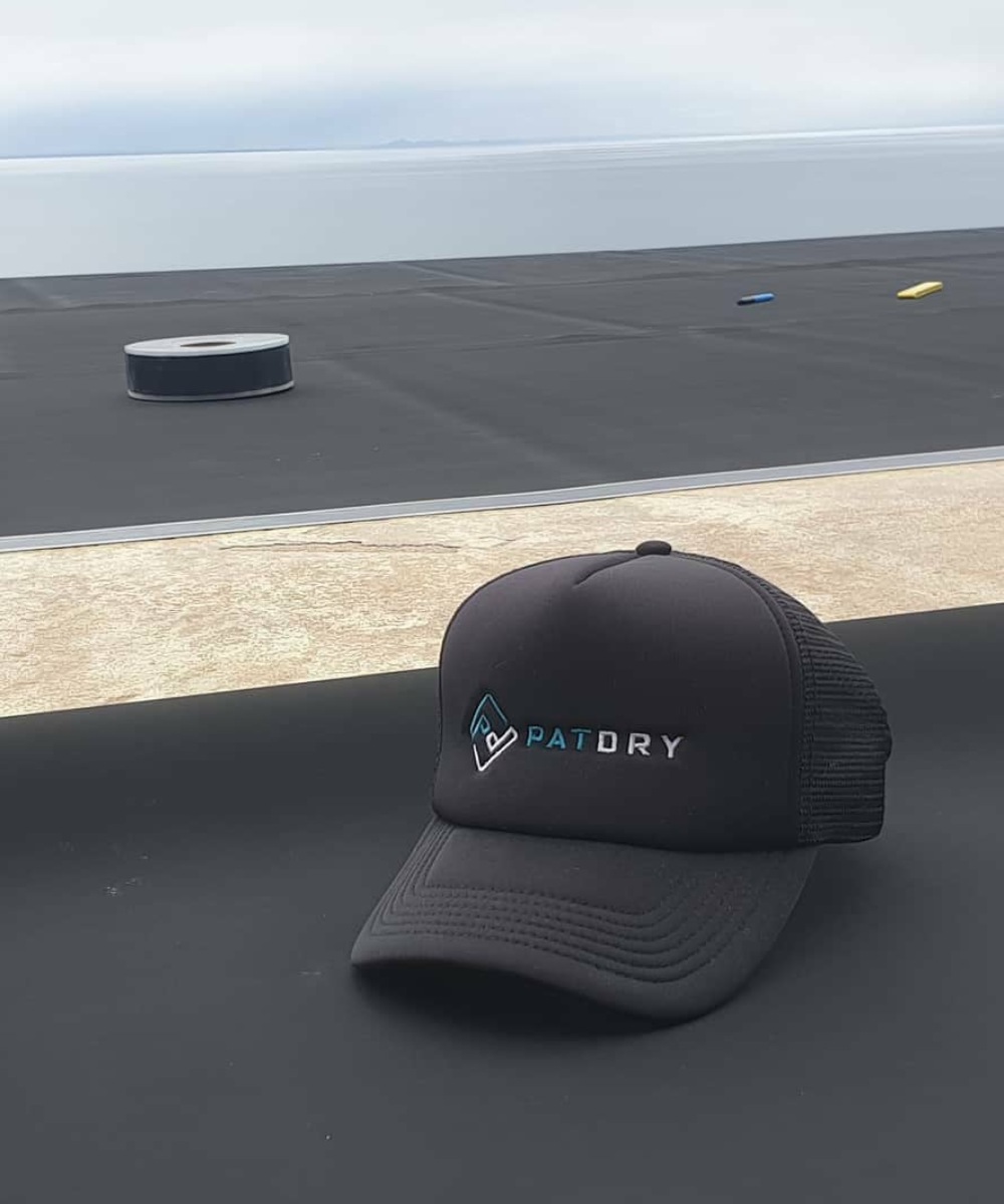 cap on roof with patdry logo